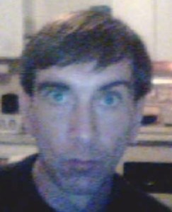 A face like TV tuned to a dead channel.
